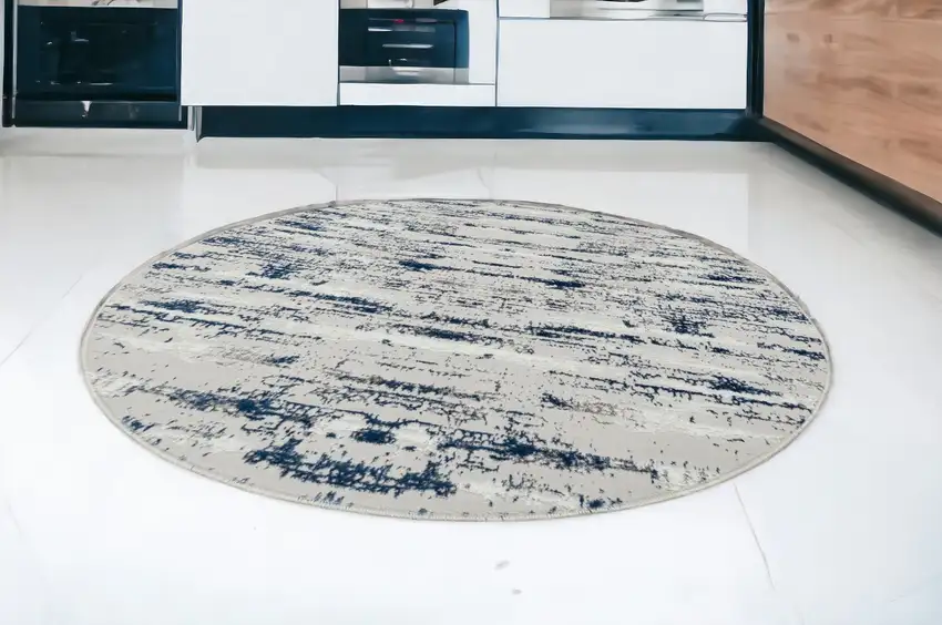 7' Navy Blue Round Abstract Washable Non Skid Area Rug With Fringe Photo 1