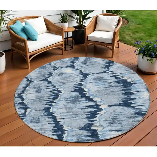 8' Navy Blue Sky Blue And Ivory Round Abstract Washable Indoor Outdoor Area Rug Photo 1