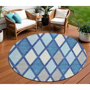 Photo of 8' Navy Blue Sky Blue And Ivory Round Geometric Washable Indoor Outdoor Area Rug