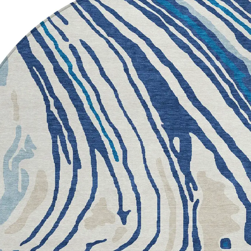 8' Navy Blue Teal Blue And Ivory Round Abstract Washable Indoor Outdoor Area Rug Photo 6
