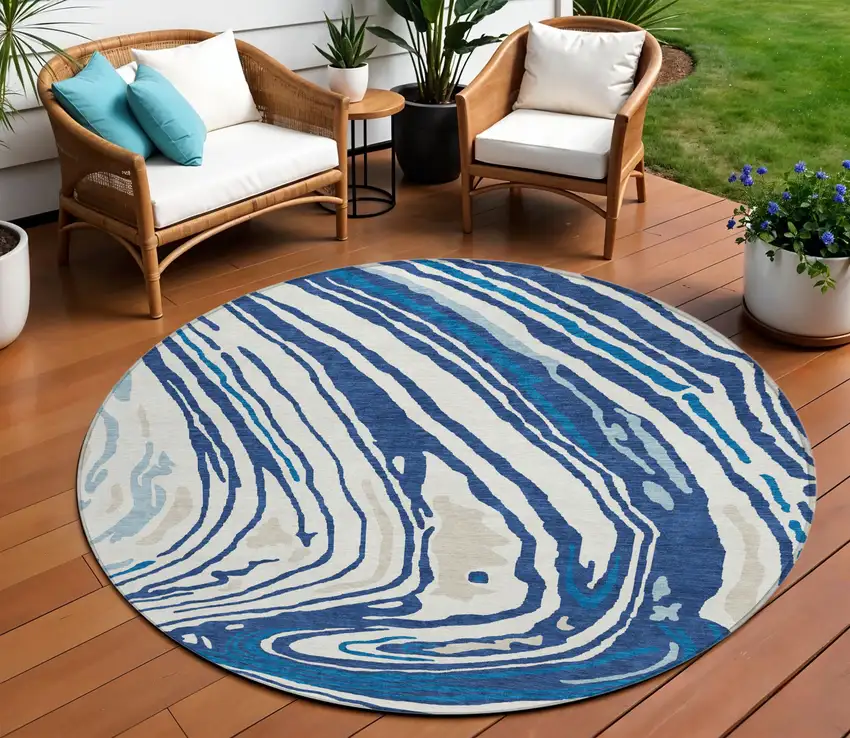8' Navy Blue Teal Blue And Ivory Round Abstract Washable Indoor Outdoor Area Rug Photo 1
