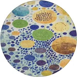 Photo of 8' Navy Blue Yellow And Green Round Geometric Washable Indoor Outdoor Area Rug