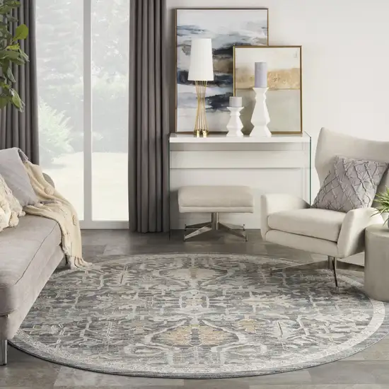 8' Navy Blue Yellow And Ivory Floral Distressed Round Rug With Fringe Photo 7