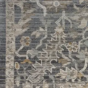 Photo of 10' Navy Blue Yellow And Ivory Oriental Distressed Runner Rug With Fringe