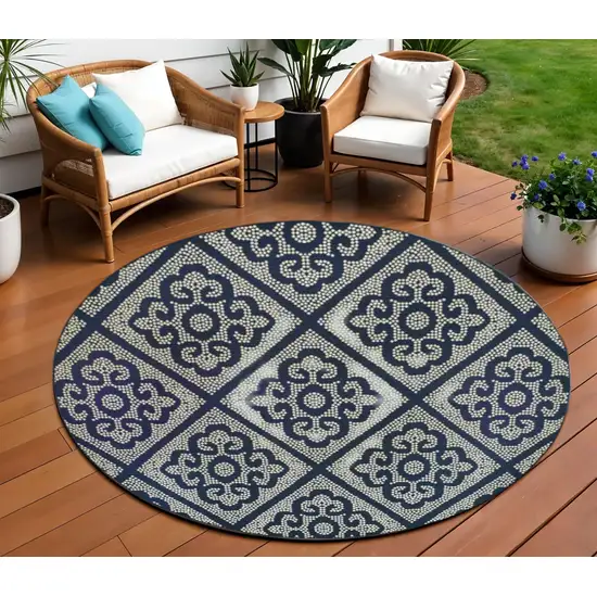 Blue and Ivory Round Geometric Stain Resistant Indoor Outdoor Area Rug Photo 1