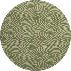 Photo of 8' Olive Green And Beige Abstract Washable Round Rug With UV Protection