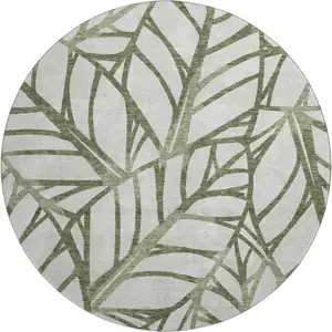 Photo of 8' Olive Green And Beige Floral Washable Round Rug With UV Protection