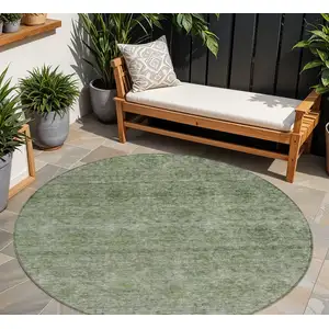 Photo of 8' Olive Green And Beige Round Floral Washable Indoor Outdoor Area Rug