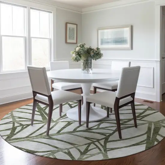 8' Olive Green And Beige Round Floral Washable Indoor Outdoor Area Rug Photo 7