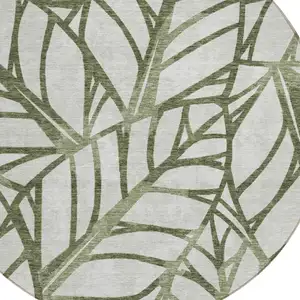 Photo of 8' Olive Green And Beige Round Floral Washable Indoor Outdoor Area Rug