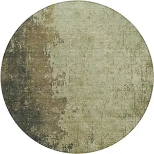 Photo of 8' Olive Green And Brown Round Abstract Washable Indoor Outdoor Area Rug