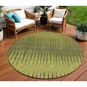 Photo of 8' Olive Green And Dark Green Round Striped Washable Indoor Outdoor Area Rug