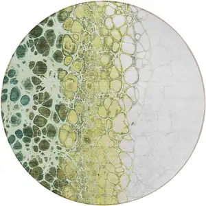 Photo of 8' Olive Green And Gold Round Abstract Washable Indoor Outdoor Area Rug