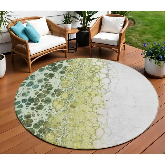 8' Olive Green And Gold Round Abstract Washable Indoor Outdoor Area Rug Photo 1