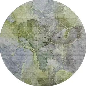 Photo of 8' Olive Green And Gray Abstract Washable Round Rug With UV Protection