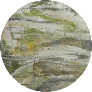 Photo of 8' Olive Green And Gray Abstract Washable Round Rug With UV Protection