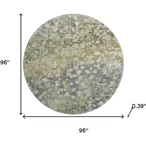 Photo of 8' Olive Green And Gray Abstract Washable Round Rug With UV Protection