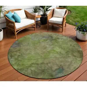 Photo of 8' Olive Green And Gray Round Abstract Washable Indoor Outdoor Area Rug