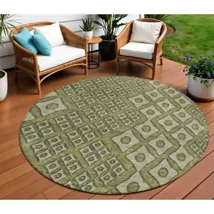 Photo of 8' Olive Green And Gray Round Geometric Washable Indoor Outdoor Area Rug