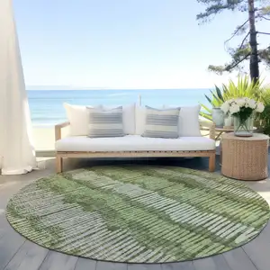Photo of 8' Olive Green And Gray Round Striped Washable Indoor Outdoor Area Rug