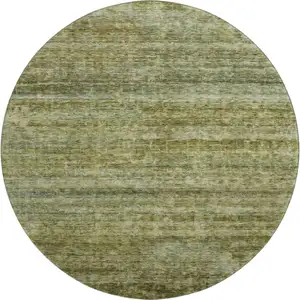 Photo of 8' Olive Green And Gray Striped Washable Round Rug With UV Protection