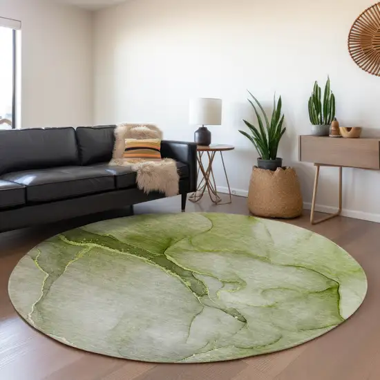 8' Olive Green And Ivory Abstract Washable Round Rug With UV Protection Photo 5