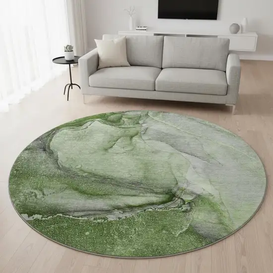 8' Olive Green And Ivory Abstract Washable Round Rug With UV Protection Photo 2