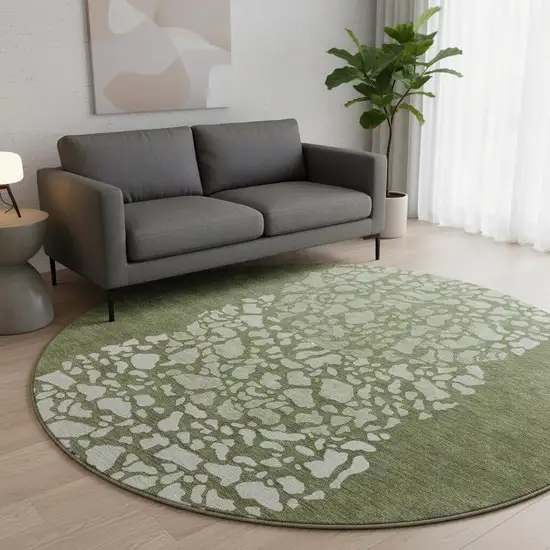 8' Olive Green And Ivory Abstract Washable Round Rug With UV Protection Photo 2
