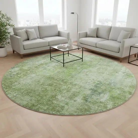 8' Olive Green And Ivory Abstract Washable Round Rug With UV Protection Photo 2