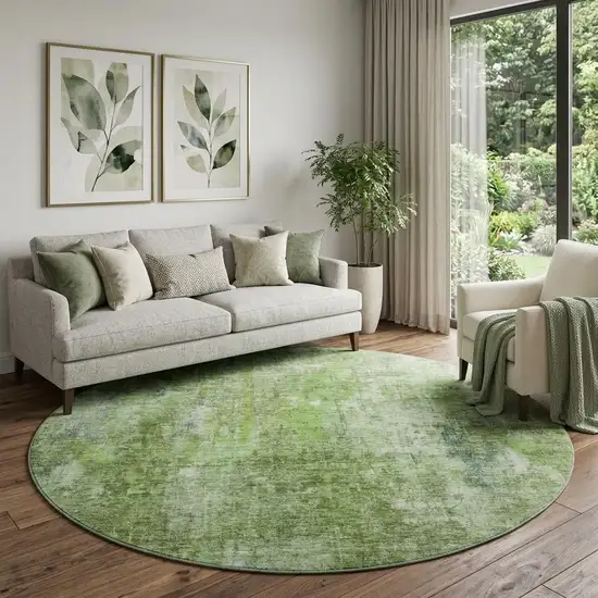8' Olive Green And Ivory Abstract Washable Round Rug With UV Protection Photo 1