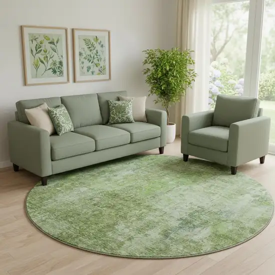 8' Olive Green And Ivory Abstract Washable Round Rug With UV Protection Photo 1