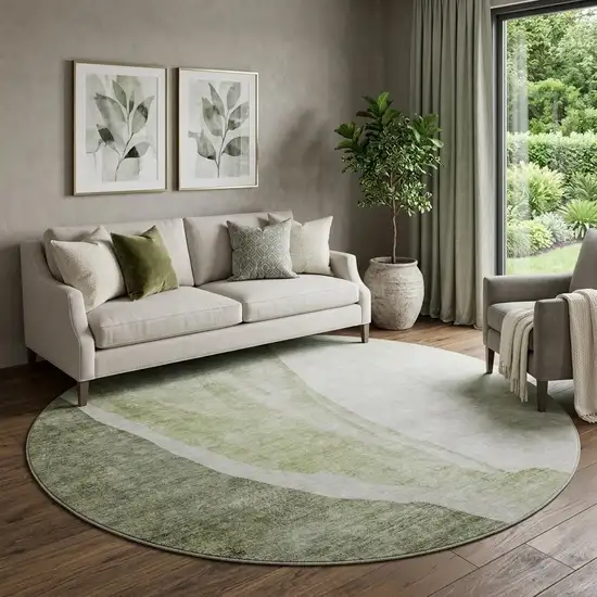 8' Olive Green And Ivory Abstract Washable Round Rug With UV Protection Photo 1