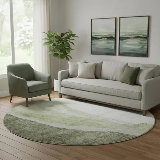 8' Olive Green And Ivory Abstract Washable Round Rug With UV Protection Photo 1