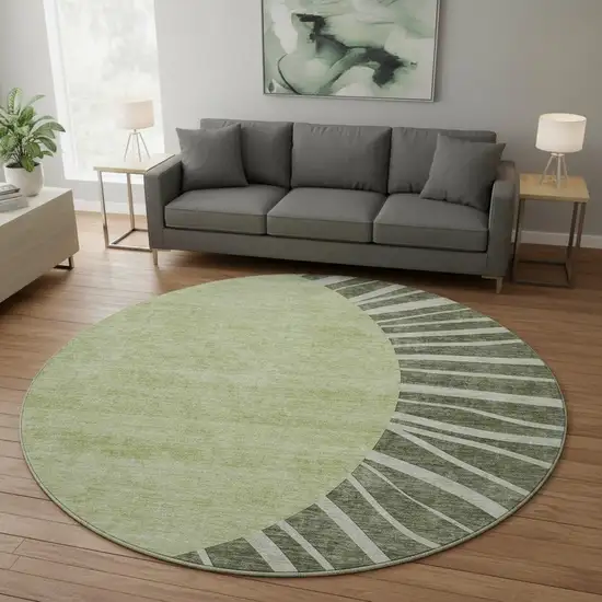 8' Olive Green And Ivory Abstract Washable Round Rug With UV Protection Photo 2