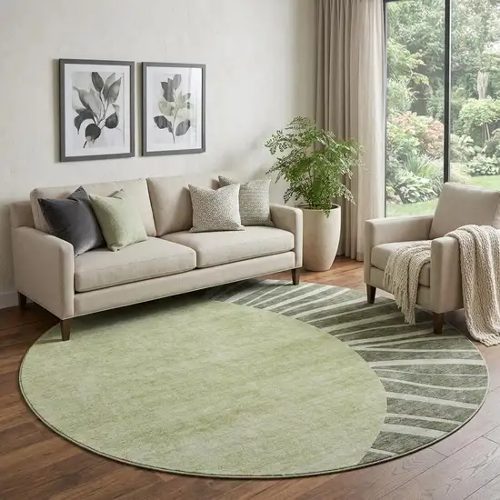 8' Olive Green And Ivory Abstract Washable Round Rug With UV Protection Photo 1