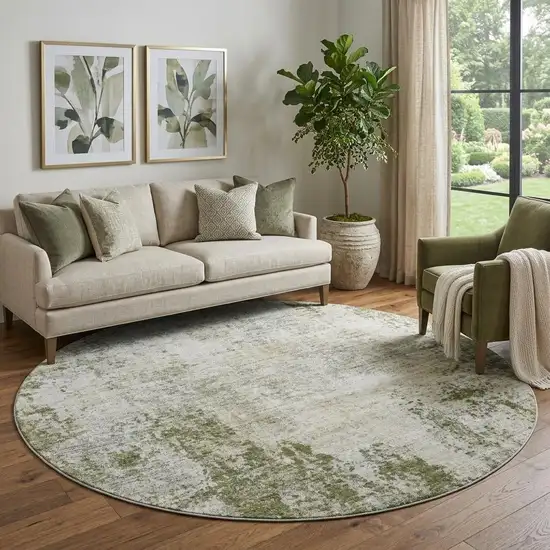 8' Olive Green And Ivory Abstract Washable Round Rug With UV Protection Photo 1
