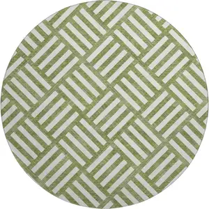 Photo of 8' Olive Green And Ivory Geometric Washable Round Rug With UV Protection