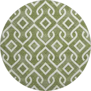 Photo of 8' Olive Green And Ivory Geometric Washable Round Rug With UV Protection