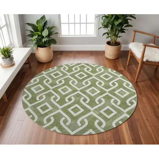 8' Olive Green And Ivory Geometric Washable Round Rug With UV Protection Photo 2