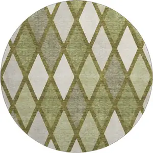 Photo of 8' Olive Green And Ivory Geometric Washable Round Rug With UV Protection