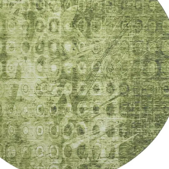 8' Olive Green And Ivory Ikat Washable Round Rug With UV Protection Photo 3