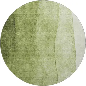 Photo of 8' Olive Green And Ivory Ombre Washable Round Rug With UV Protection