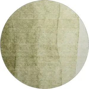 Photo of 8' Olive Green And Ivory Ombre Washable Round Rug With UV Protection