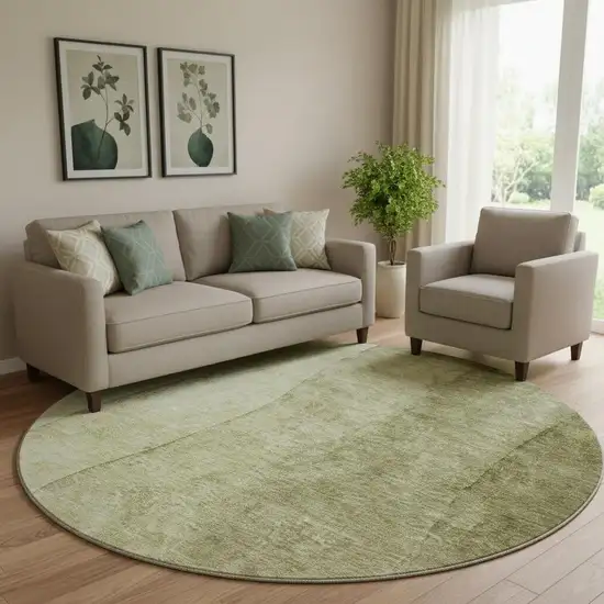 8' Olive Green And Ivory Ombre Washable Round Rug With UV Protection Photo 1