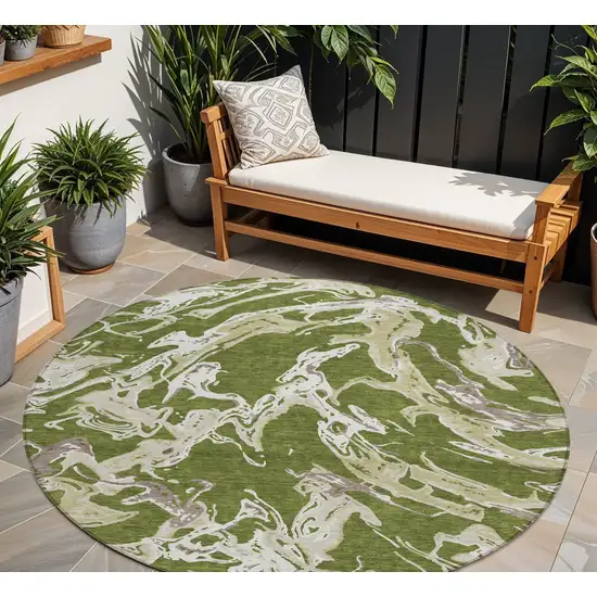 8' Olive Green And Ivory Round Abstract Washable Indoor Outdoor Area Rug Photo 1
