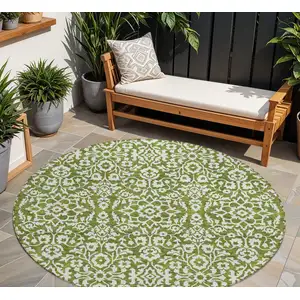Photo of 8' Olive Green And Ivory Round Damask Washable Indoor Outdoor Area Rug