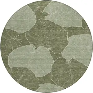 Photo of 8' Olive Green And Ivory Round Floral Washable Indoor Outdoor Area Rug
