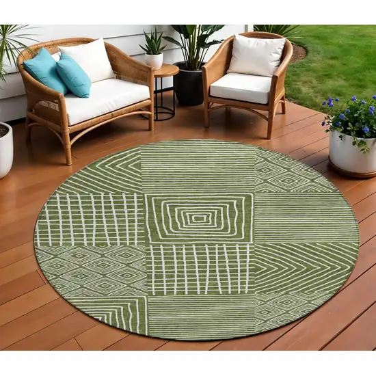 8' Olive Green And Ivory Round Geometric Washable Indoor Outdoor Area Rug Photo 1