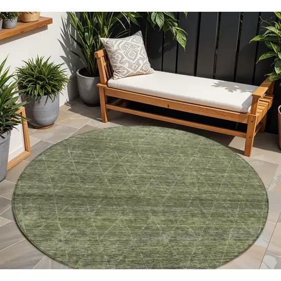 8' Olive Green And Ivory Round Geometric Washable Indoor Outdoor Area Rug Photo 1