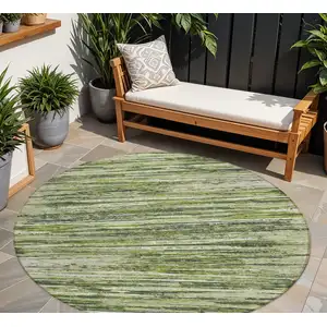 Photo of 8' Olive Green And Ivory Round Striped Washable Indoor Outdoor Area Rug